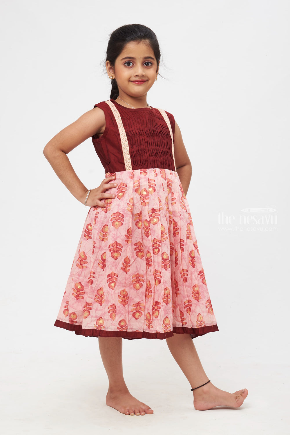 The Nesavu Girls Cotton Frock Pink Peacock Feather Delight with Lace Accents Cotton Frocks for Girls Nesavu Pink Cotton Dress with Peacock Feather Motifs | Timeless Elegance for Little Girls | The Nesavu