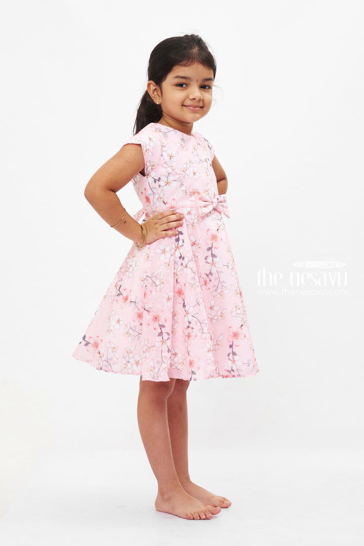 The Nesavu Girls Fancy Frock Pink Sakura Charm Frock: Girls' Blossom Print Dress with Bow Detail Nesavu Girls Pink Cherry Blossom Dress | Cap Sleeve Frock with Bow | Spring Party Attire | The Nesavu