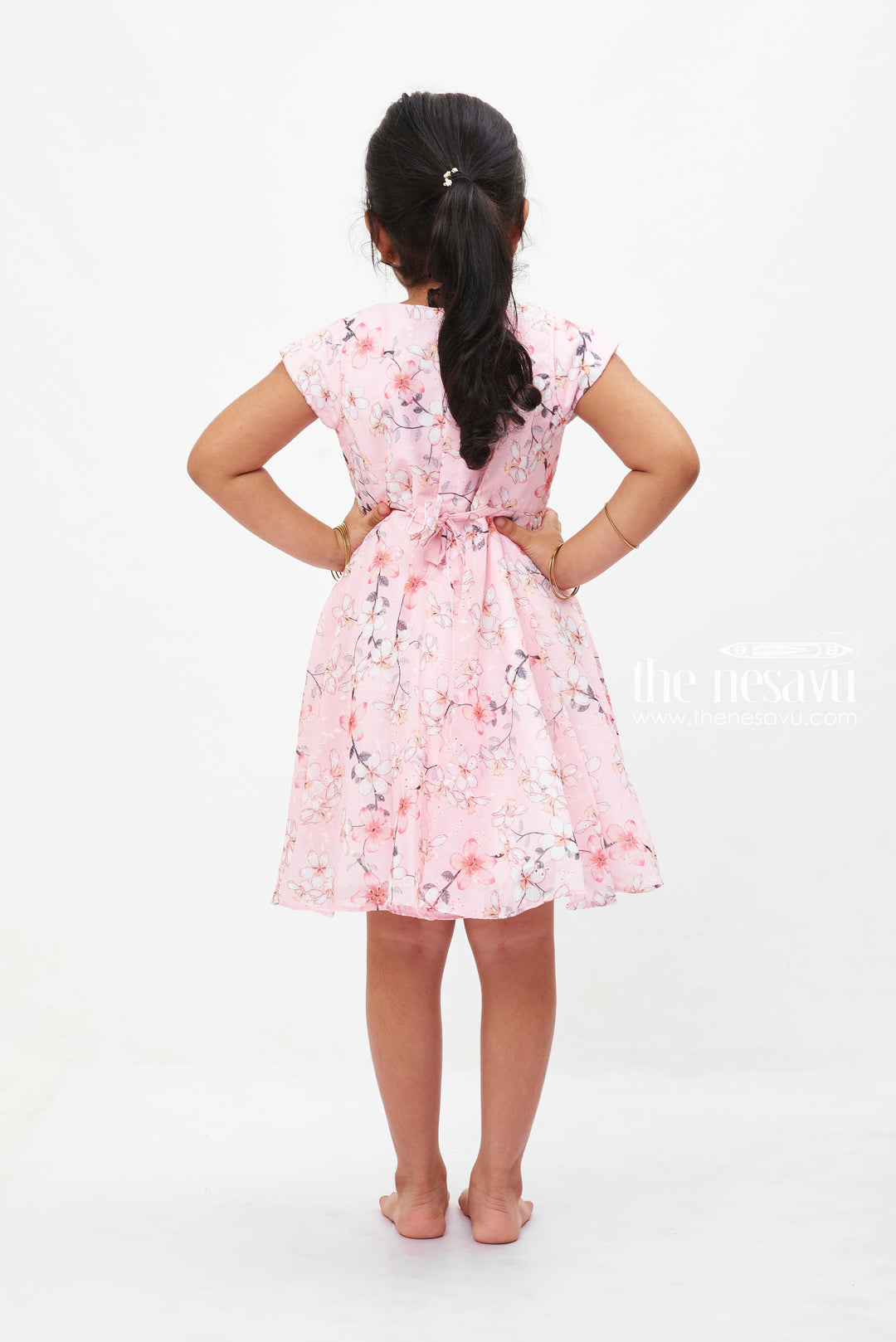 The Nesavu Girls Fancy Frock Pink Sakura Charm Frock: Girls' Blossom Print Dress with Bow Detail Nesavu Girls Pink Cherry Blossom Dress | Cap Sleeve Frock with Bow | Spring Party Attire | The Nesavu