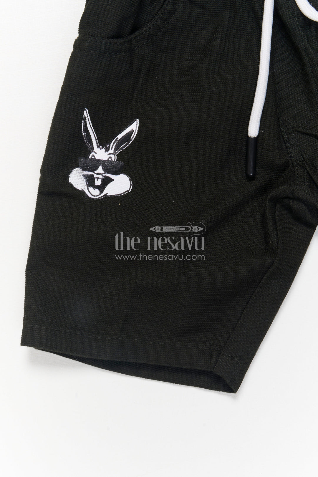 The Nesavu Boys Shorts Playful Boys Shorts in Soft Cotton with Elastic Waist and Bold Text Nesavu Kids cotton shorts for boys with rabbit print and drawstring – everyday casual wear
