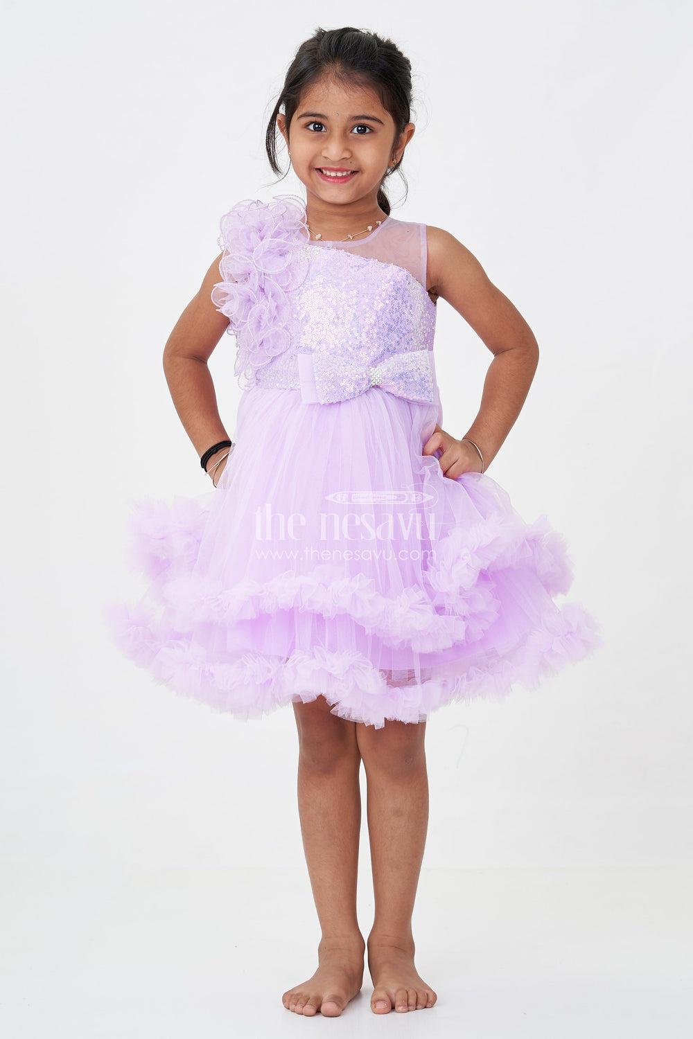 The Nesavu Girls Fancy Party Frock Princess Dress Purple for Girls in Net with Layered Frills and Glitter Bow Accent Nesavu Princess Dress Purple Girls Net Sequin Bodice Frilly Tulle Skirt | The Nesavu