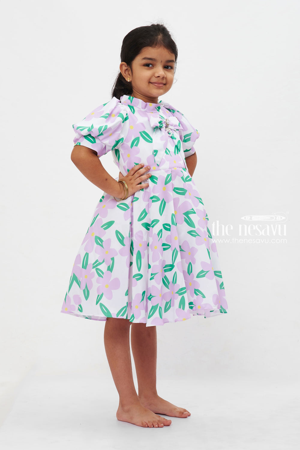 The Nesavu Girls Fancy Frock Purple Blossom Frock with Sparkling Brooch for Girls Nesavu Girls Lavender Floral Frock | Cheerful Spring Dress with Brooch | The Nesavu