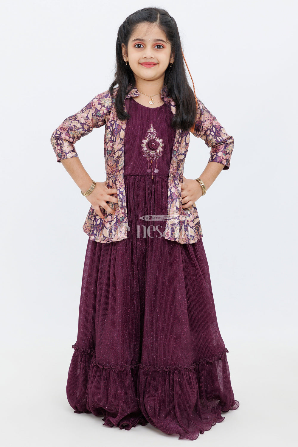 The Nesavu Girls Party Gown Purple Chinon Silk Printed Party Gown with Pleated Design and Floral Jacket for Girls Nesavu Purple Chinon Silk Printed Party Gown with Floral Jacket for Girls Nesavu