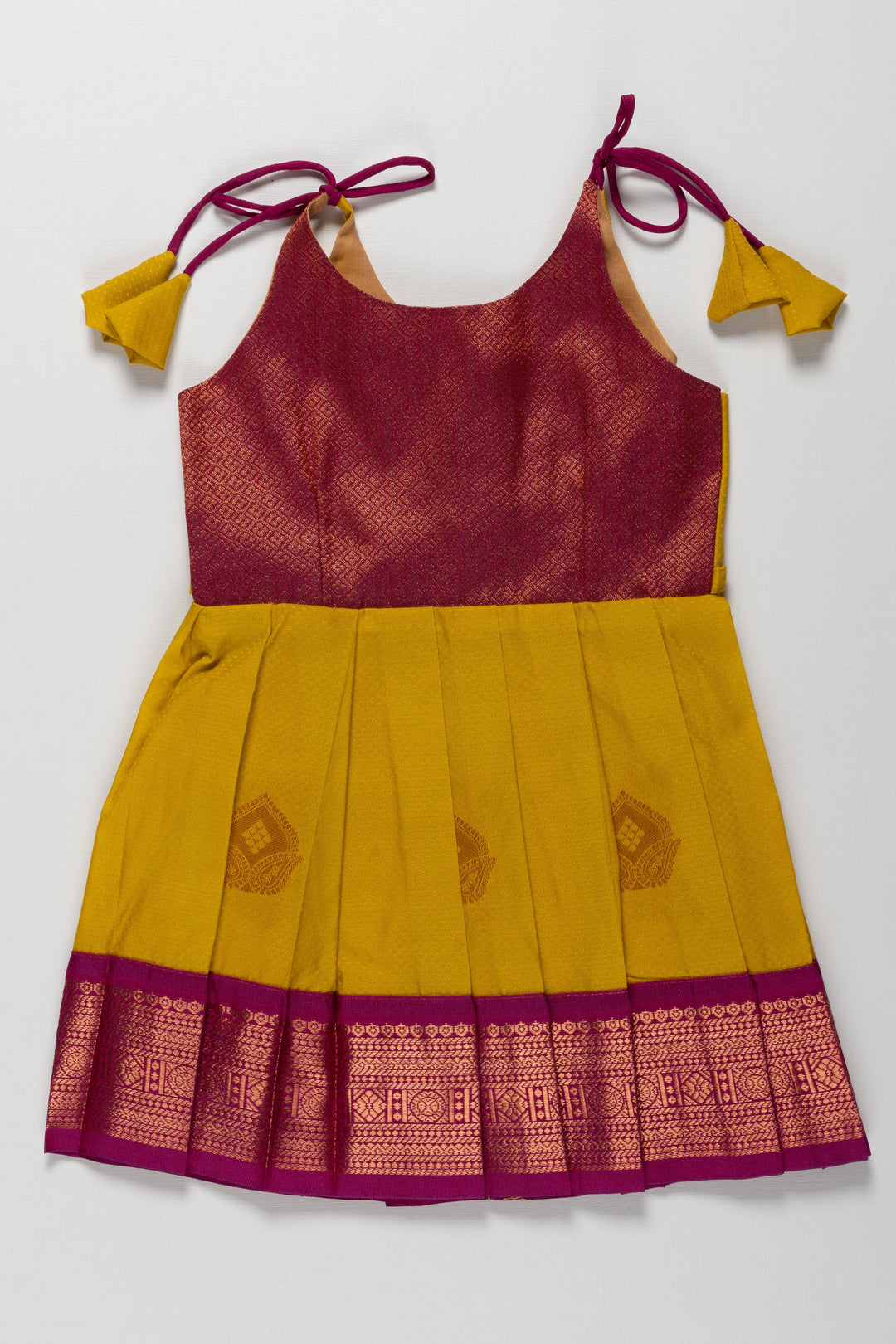 The Nesavu Tie-up Frock Radiant Silk Knot-Tie Frock for Namakarana and Karnavedha: Diverse and Bold Color Combinations Nesavu 14 (6M) / Yellow / Style 3 T379C-14 Stylish Maroon and Gold Silk Dresses for Kids | Unique Party Wear with Adjustable Ties | The Nesavu