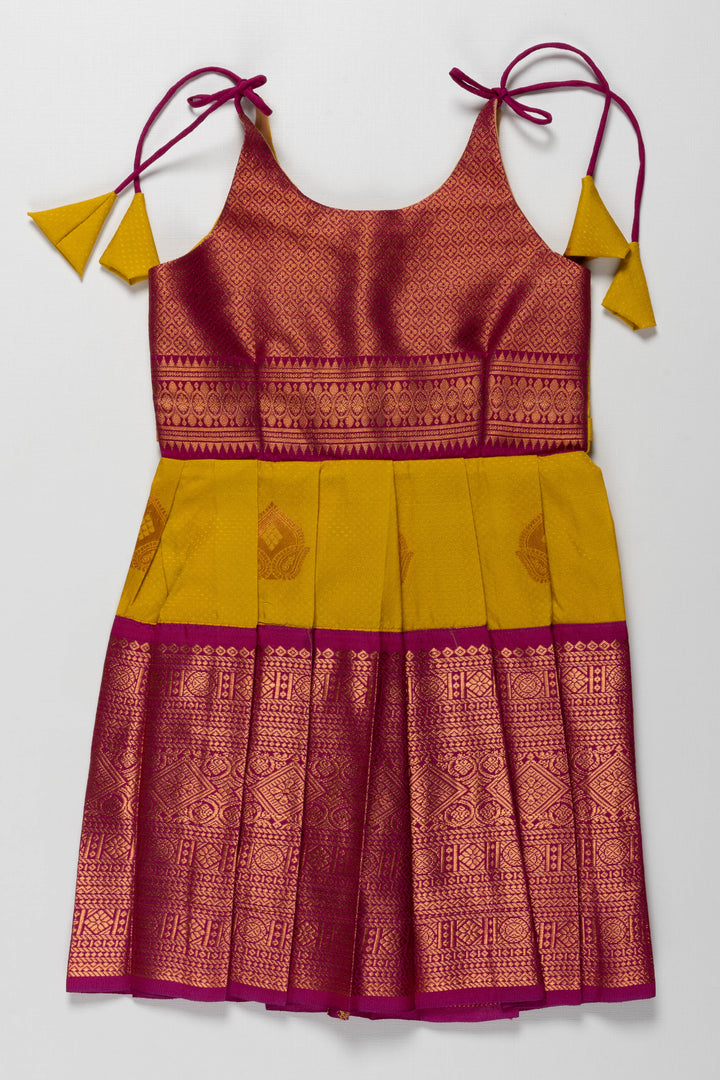 The Nesavu Tie-up Frock Radiant Silk Knot-Tie Frock for Namakarana and Karnavedha: Diverse and Bold Color Combinations Nesavu Stylish Maroon and Gold Silk Dresses for Kids | Unique Party Wear with Adjustable Ties | The Nesavu