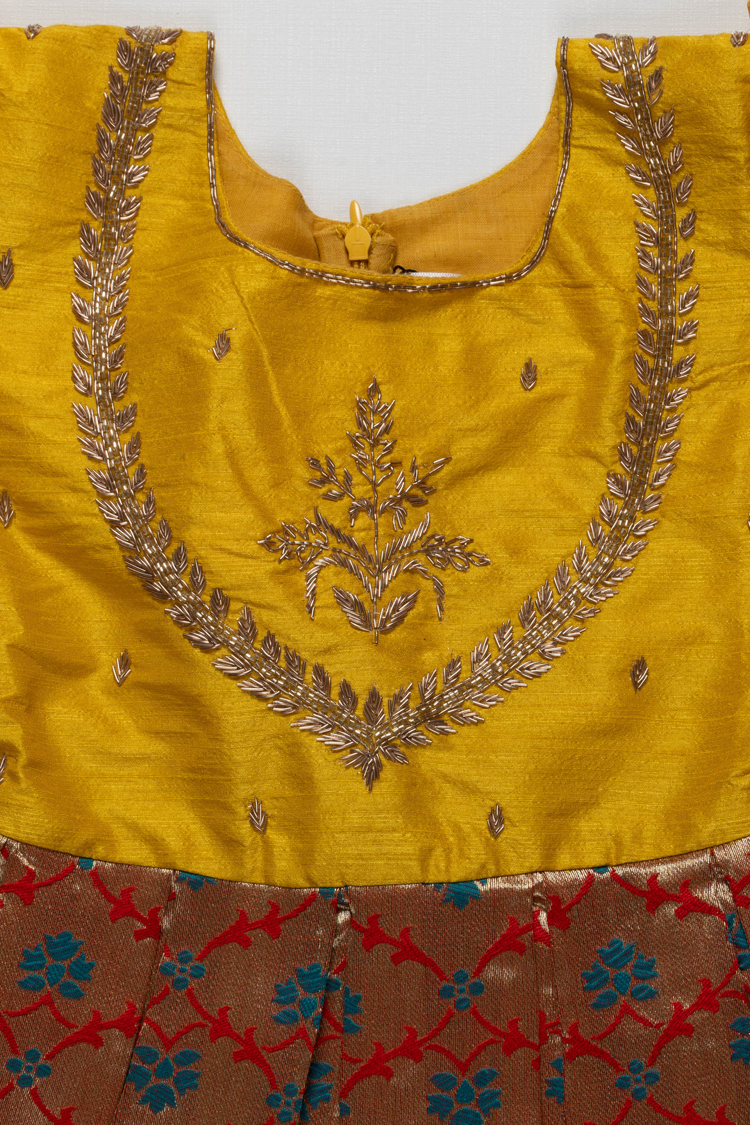 The Nesavu Silk Party Frock Radiant Yellow and Gold Pattu Silk Frock: Exquisite Floral Banarasi Design with Intricate Embroidery for Girls Nesavu Yellow and Gold Pattu Silk Frock | Exquisite Floral Banarasi Design | Festive Wear for Girls | The Nesavu