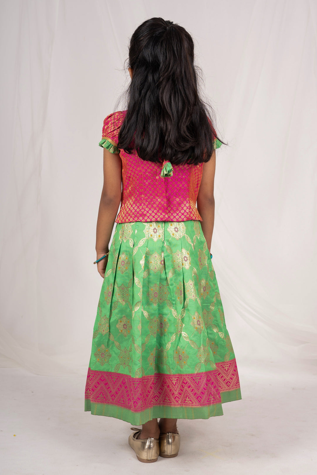 Deep Magenta Pink Semi Kanchi Jacquard Silk Pattu Pavada With Contrasting Peplum Blouse