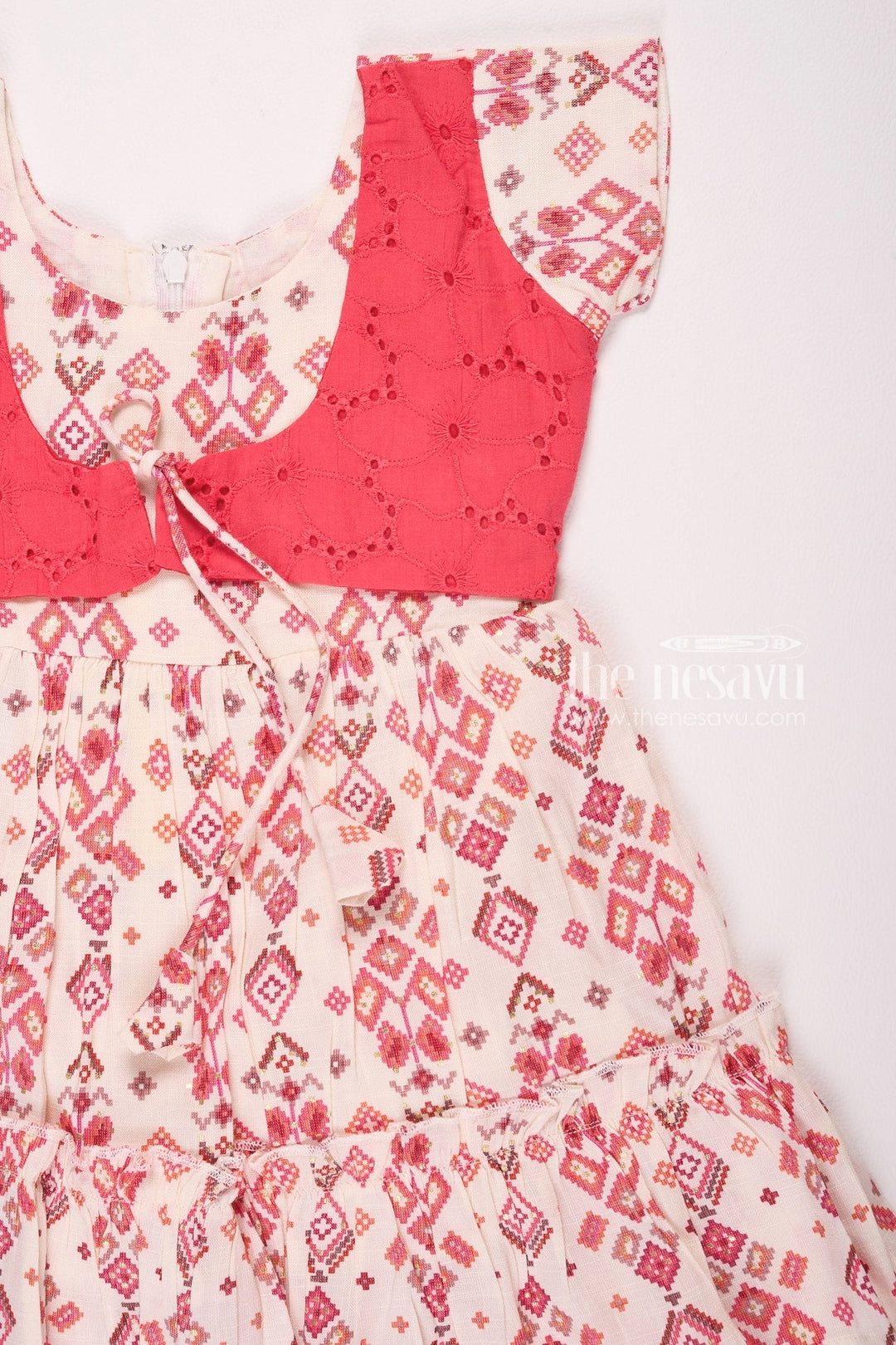 The Nesavu Girls Cotton Frock Red and Cream Geometric Print Dress with Embroidered Bodice for Girls Nesavu Red and Cream Geometric Print Dress with Embroidered Bodice for Girls - Stylish & Comfortable