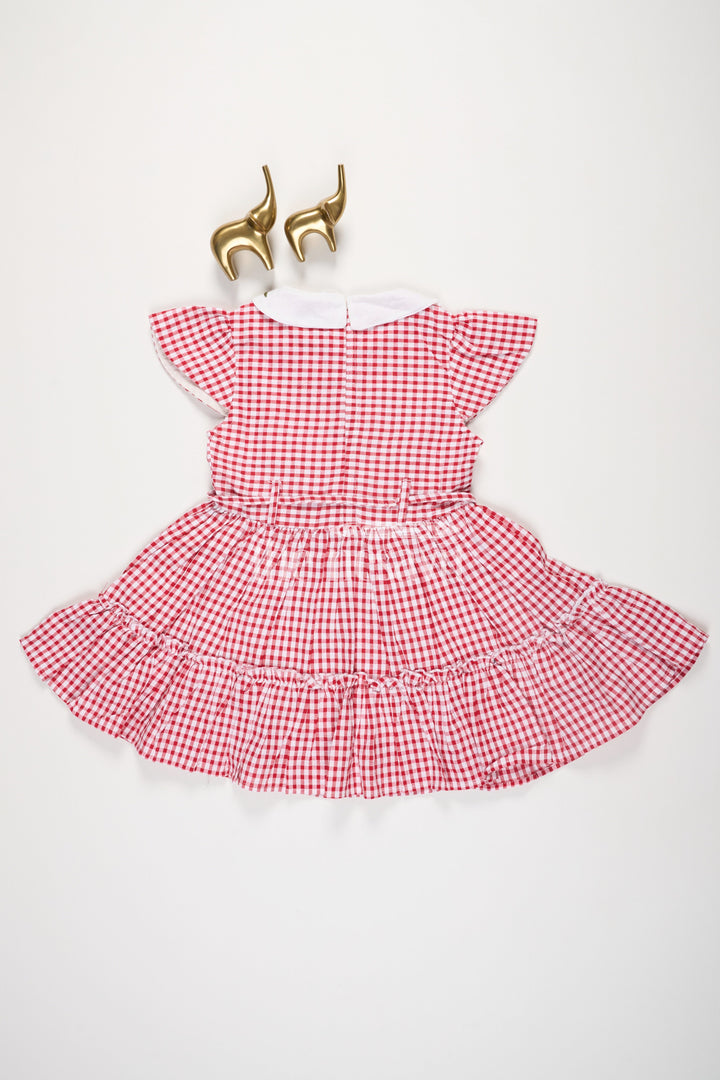 The Nesavu Girls Cotton Frock Red and White Checked Cotton Frock for Girls with Floral Embroidery and Peter Pan Collar Nesavu Red and White Checked Cotton Frock for Girls with Floral Embroidery and Peter Pan Collar Nesavu