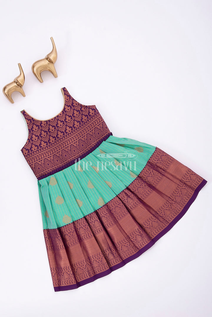 The Nesavu Girls Kanchi Silk Frock Royal Festive Attire for Little Ones: Purple and Green Kanji Border Silk Frock Nesavu