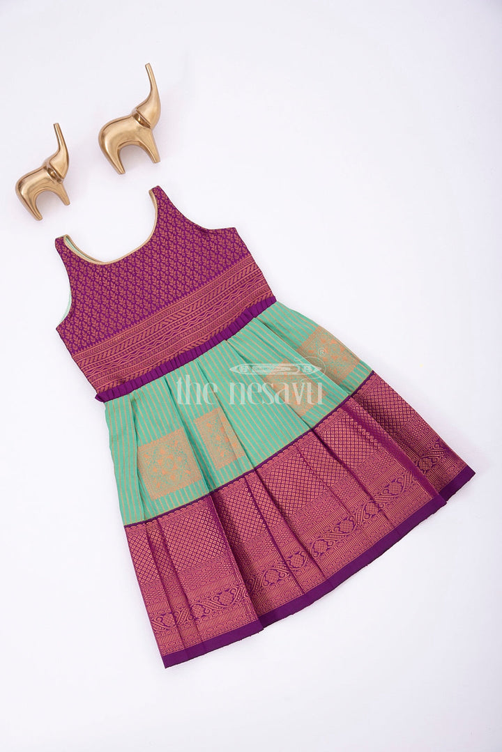 The Nesavu Girls Kanchi Silk Frock Royal Festive Attire: Purple and Green Kanji Border Silk Frock for Girls Nesavu Royal Festive Attire: Purple and Green Kanji Border Silk Frock for Girls - Traditional Wear