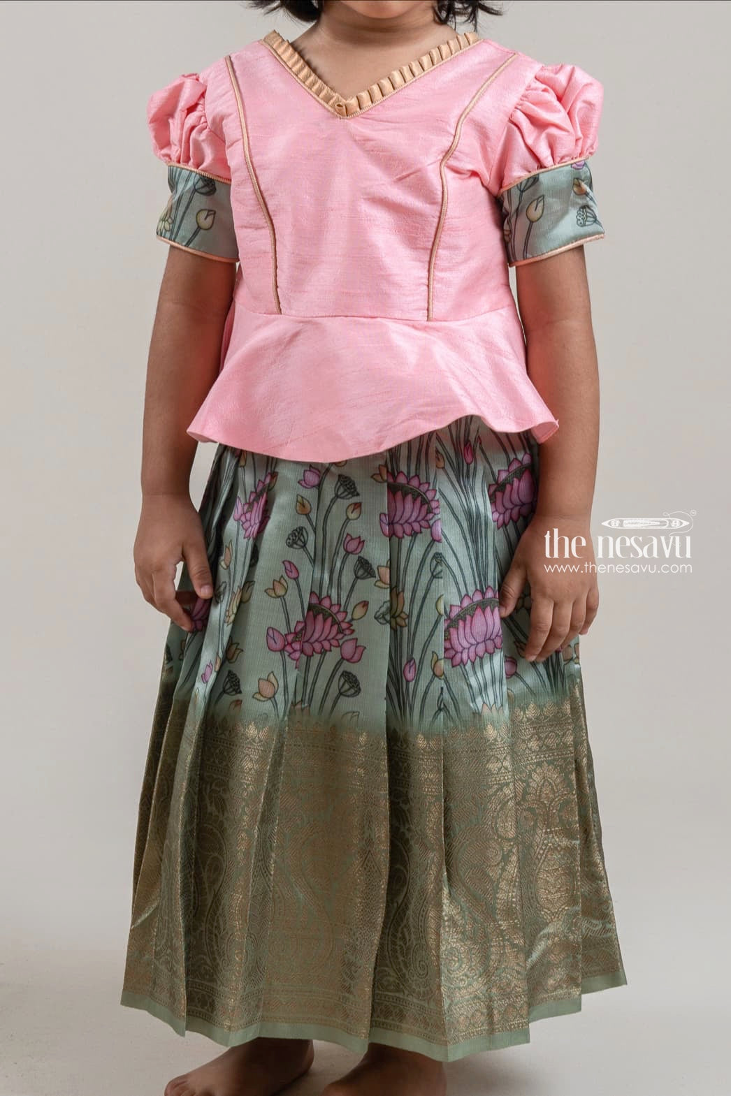 The Nesavu Pattu Pavadai Salmon Pink Silk Blouse N Green Floral Printed Pattu Pavadai for Girls Nesavu Premium Pattu pavadai |Banarasi Border for Girls | The Nesavu