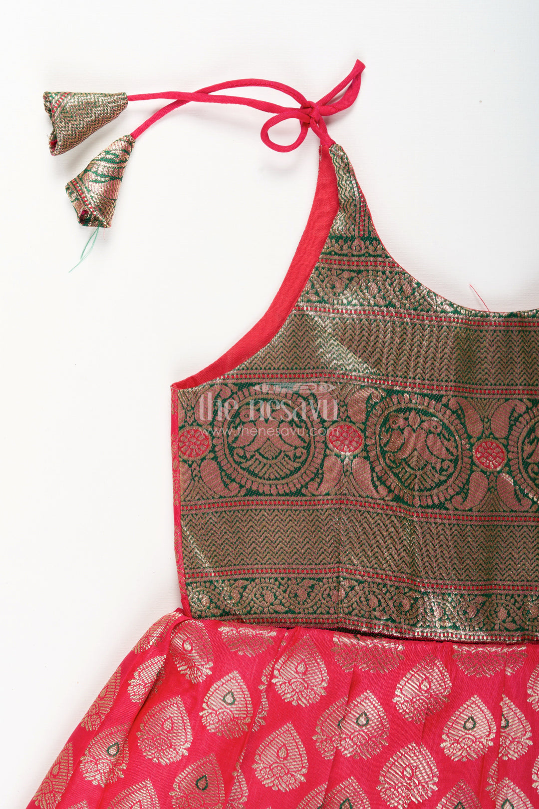 The Nesavu Tie-up Frock Semi Banaras Silk Tie-Up Frock for Baby Girl Green and Red Ethnic Dress Nesavu Nesavu semi Banaras silk frock for baby girl – red and green ethnic tie-up dress for celebrations