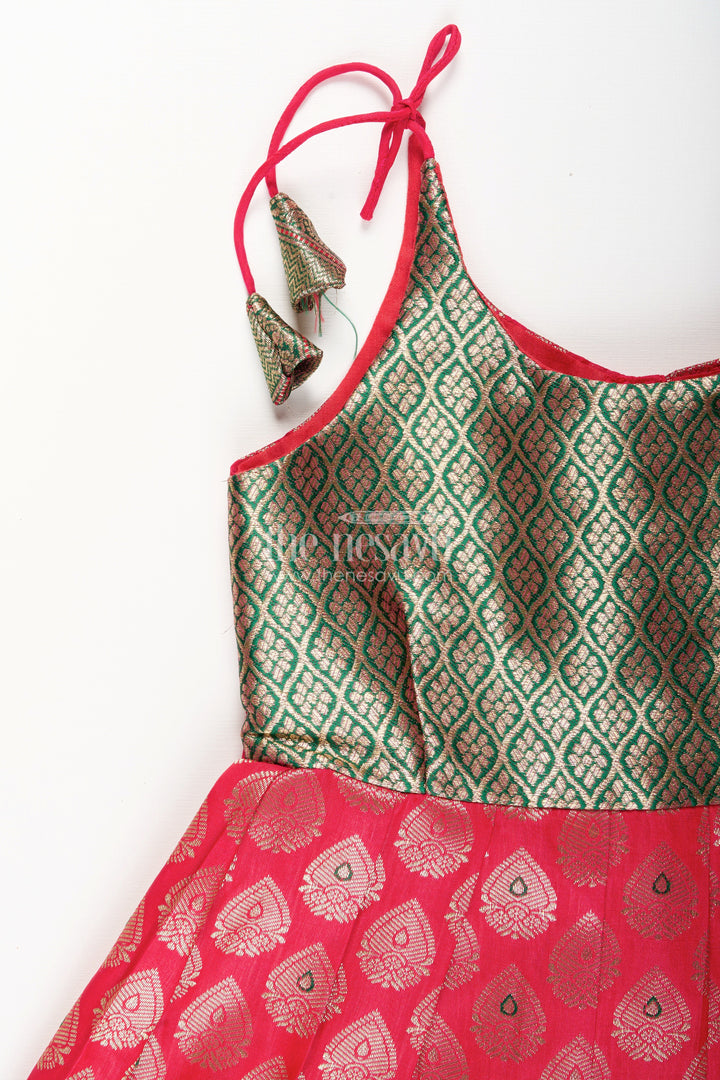 The Nesavu Tie-up Frock Semi Banaras Silk Tie-Up Frock for Baby Girl Green and Red Ethnic Dress Nesavu Nesavu semi Banaras silk frock for baby girl – red and green ethnic tie-up dress for celebrations