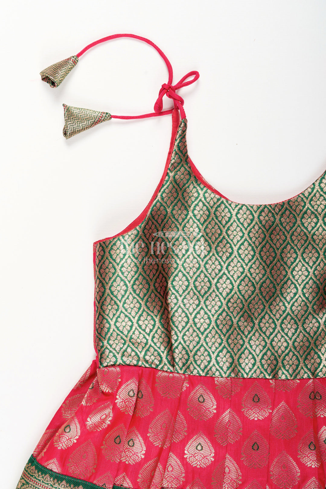 The Nesavu Tie-up Frock Semi Banaras Silk Tie-Up Frock for Baby Girl Green and Red Ethnic Dress Nesavu Nesavu semi Banaras silk frock for baby girl – red and green ethnic tie-up dress for celebrations