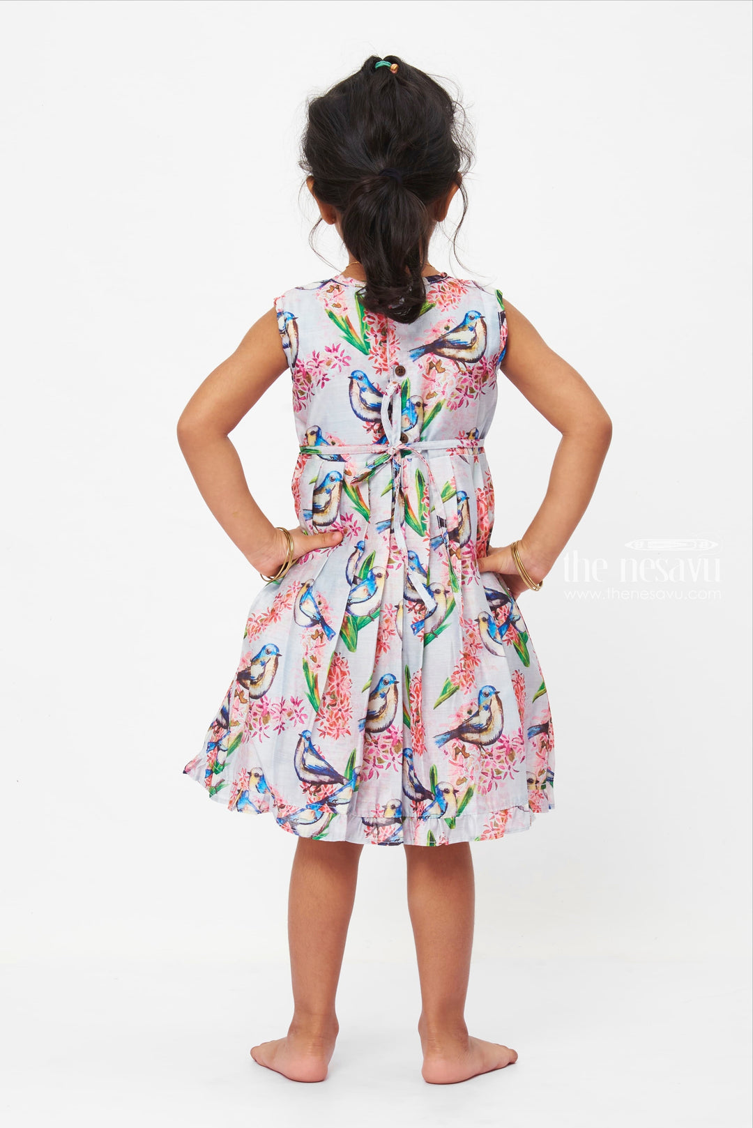 The Nesavu Girls Cotton Frock Serenade of Spring Dress: Sleeveless Bird & Bloom Print Frock for Girls Nesavu Girls Spring Bird Print Lace Dress | Grey Floral Frock | Playful Ruffled Hem | The Nesavu