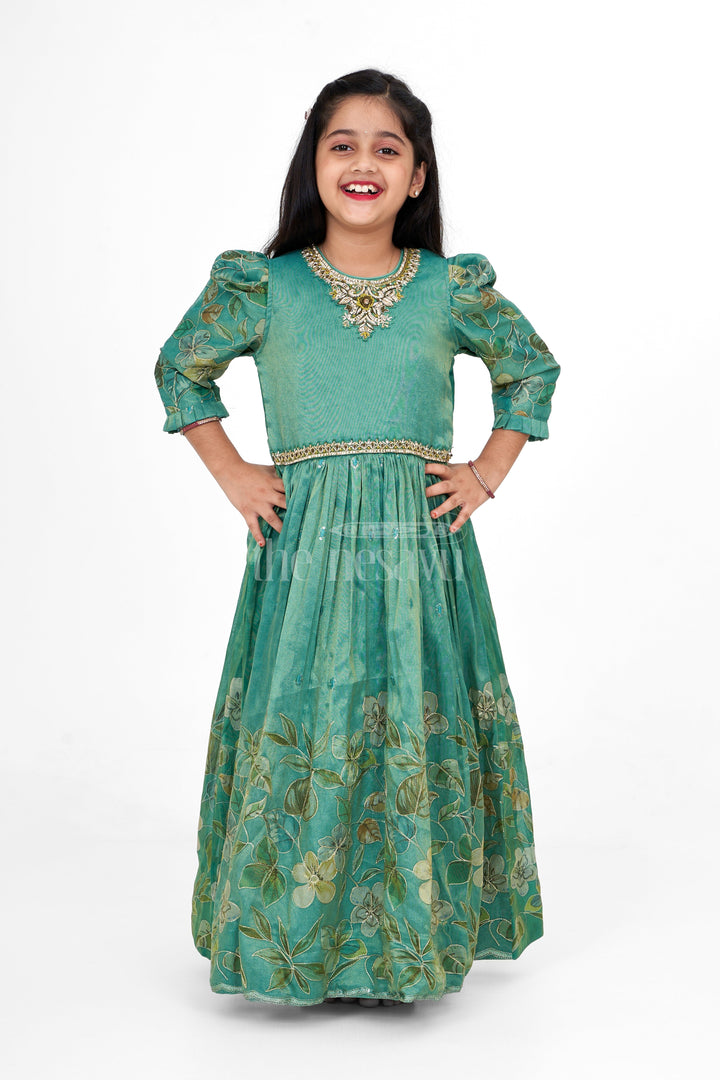 The Nesavu Girls Party Gown Shimmer Tissue Printed Girls Party Gown with Floral Motif for Evening Events and Celebrations Nesavu Nesavu Shimmer Tissue Green Girls Evening Gown Floral Print Ideal Special Celebrations Family Gatherings