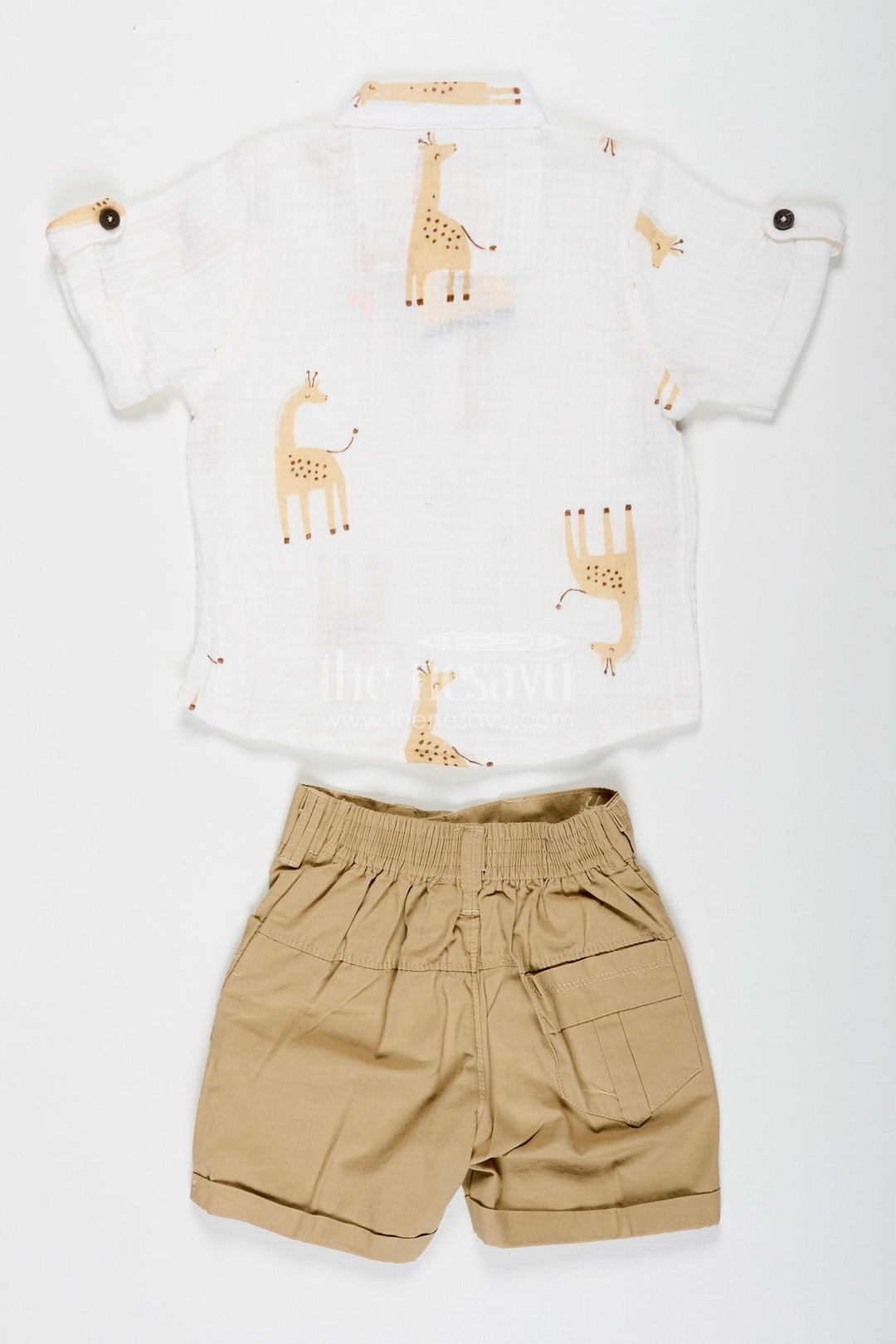 The Nesavu Boys Casual Set Shirt Trouser Set for Boys in Muslin Cotton with Giraffe Print and Button Detail On Cream Shirt and Khaki Shorts Nesavu Shirt Trouser Set for Boys in Muslin Cotton with Giraffe Print Shirt and Comfortable Khaki Shorts | The Nesavu