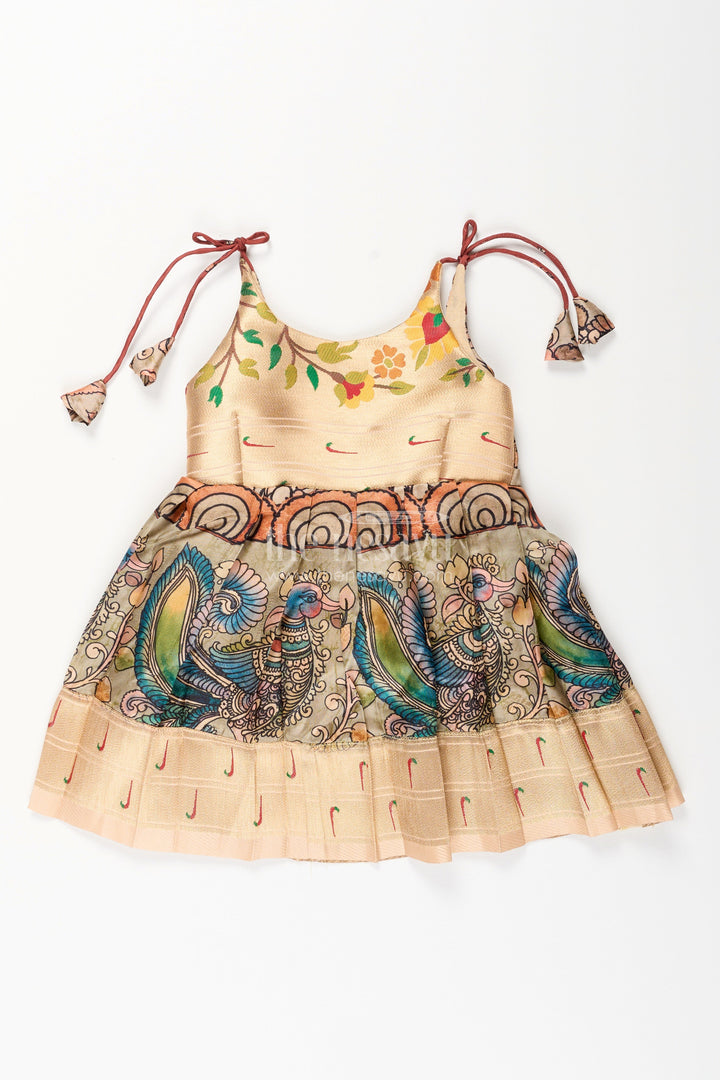 The Nesavu Tie-up Frock Silk Blend Kalamkari Tie-Up Frock for Baby Girls with Peacock Border Nesavu 14 (6M) / Yellow / Style 2 T412B-14 Nesavu Kalamkari silk blend tie-up frock for baby girls – peacock motif festive dress