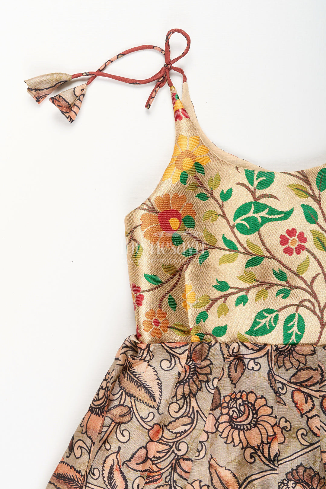 The Nesavu Tie-up Frock Silk Blend Kalamkari Tie-Up Frock for Baby Girls with Peacock Border Nesavu Nesavu Kalamkari silk blend tie-up frock for baby girls – peacock motif festive dress