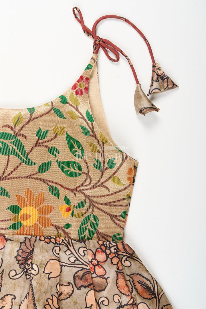 The Nesavu Tie-up Frock Silk Blend Kalamkari Tie-Up Frock for Baby Girls with Peacock Border Nesavu Nesavu Kalamkari silk blend tie-up frock for baby girls – peacock motif festive dress