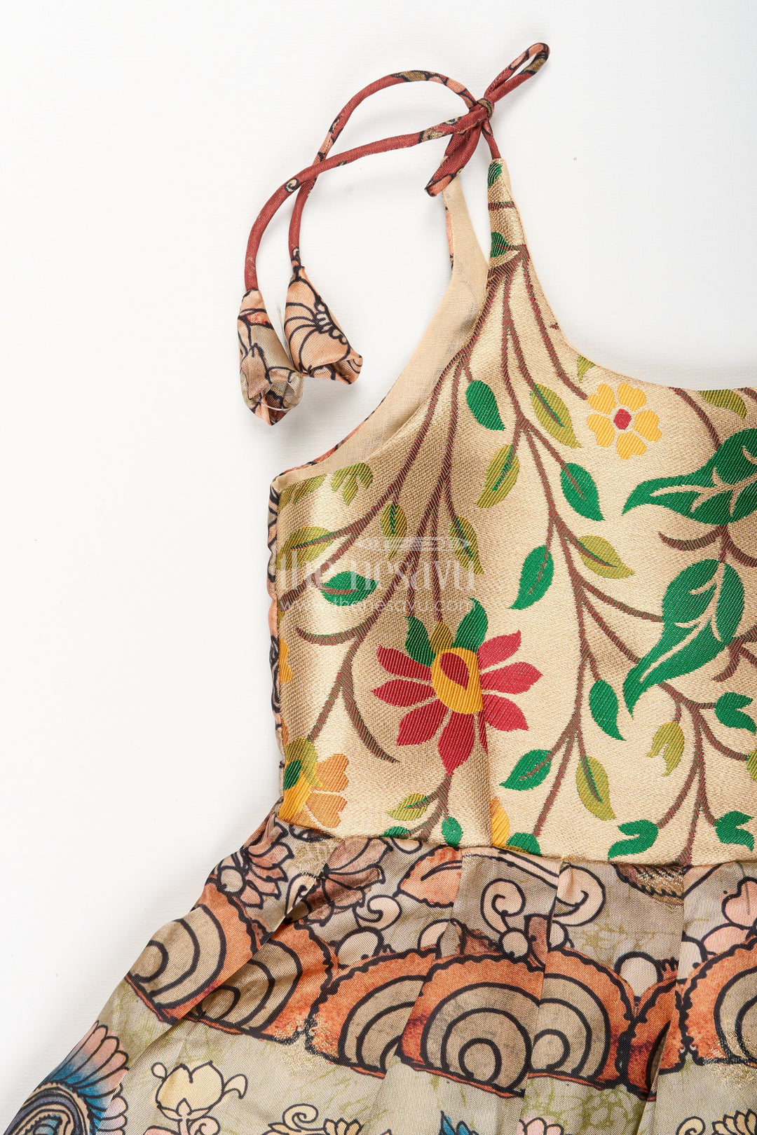 The Nesavu Tie-up Frock Silk Blend Kalamkari Tie-Up Frock for Baby Girls with Peacock Border Nesavu Nesavu Kalamkari silk blend tie-up frock for baby girls – peacock motif festive dress