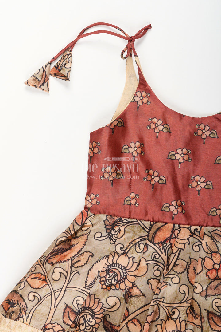 The Nesavu Tie-up Frock Silk Blend Kalamkari Tie-Up Frock for Baby Girls with Peacock Border Nesavu Nesavu Kalamkari silk blend tie-up frock for baby girls – peacock motif festive dress