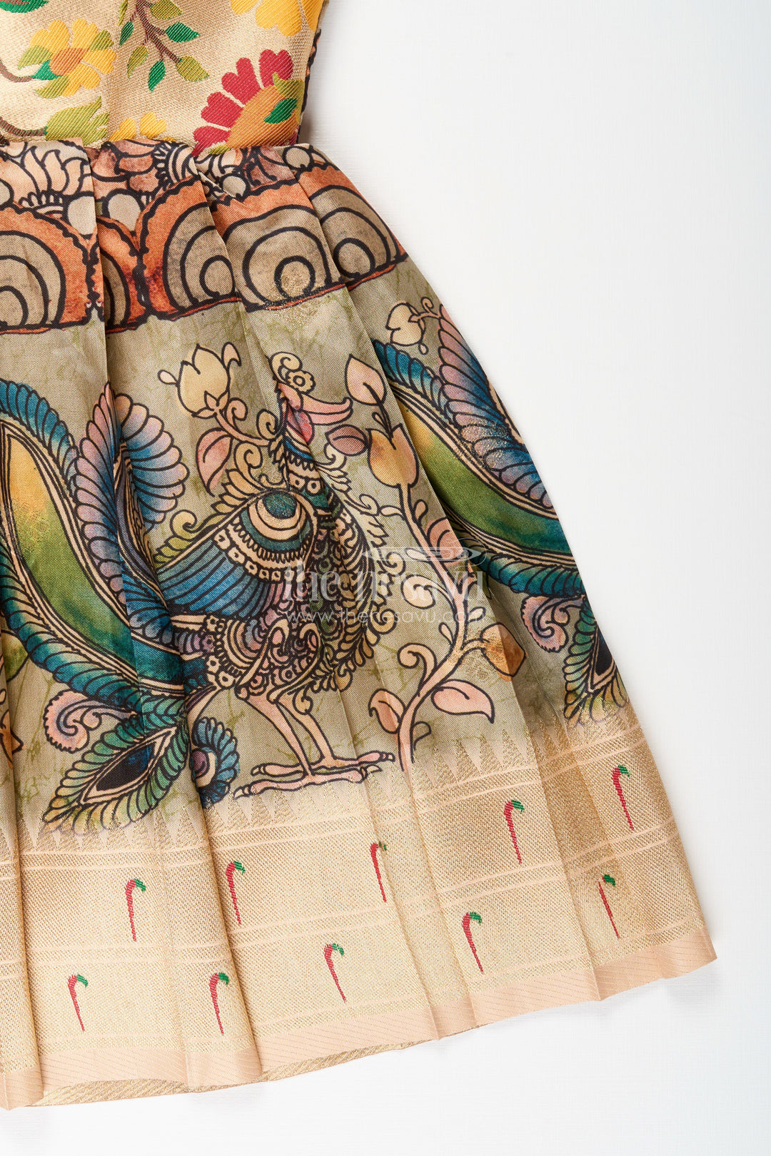 The Nesavu Tie-up Frock Silk Blend Kalamkari Tie-Up Frock for Baby Girls with Peacock Border Nesavu Nesavu Kalamkari silk blend tie-up frock for baby girls – peacock motif festive dress