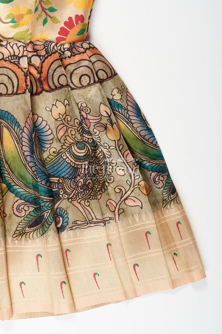 The Nesavu Tie-up Frock Silk Blend Kalamkari Tie-Up Frock for Baby Girls with Peacock Border Nesavu Nesavu Kalamkari silk blend tie-up frock for baby girls – peacock motif festive dress
