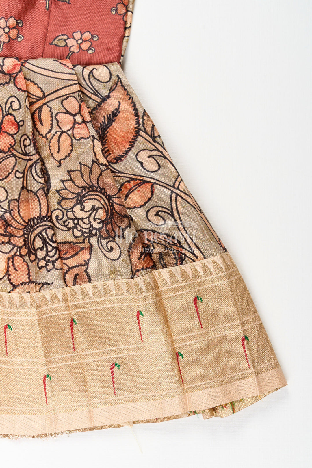 The Nesavu Tie-up Frock Silk Blend Kalamkari Tie-Up Frock for Baby Girls with Peacock Border Nesavu Nesavu Kalamkari silk blend tie-up frock for baby girls – peacock motif festive dress