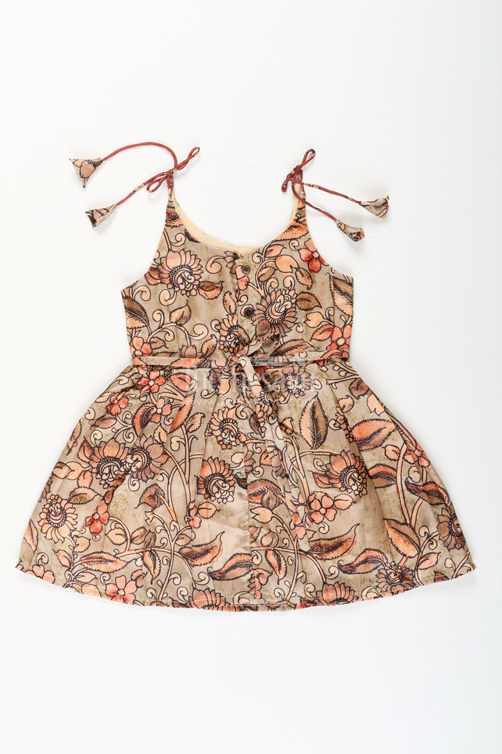 The Nesavu Tie-up Frock Silk Blend Kalamkari Tie-Up Frock for Baby Girls with Peacock Border Nesavu Nesavu Kalamkari silk blend tie-up frock for baby girls – peacock motif festive dress