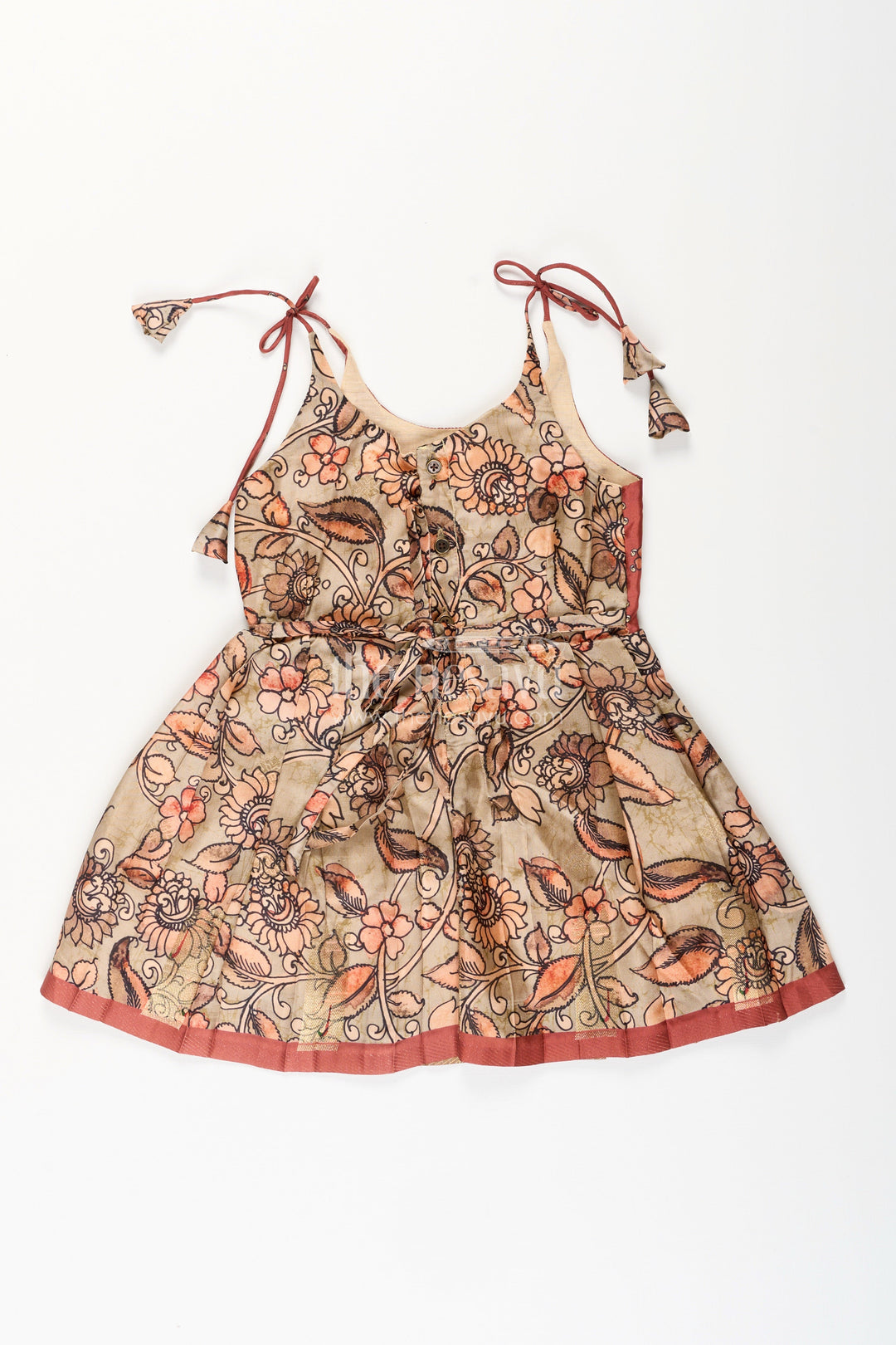 The Nesavu Tie-up Frock Silk Blend Kalamkari Tie-Up Frock for Baby Girls with Peacock Border Nesavu Nesavu Kalamkari silk blend tie-up frock for baby girls – peacock motif festive dress