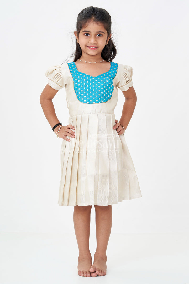 The Nesavu Silk Frock Silk Frock for Baby Girl in Ivory Tissue Silk with Emerald Embellished Yoke and Puff Sleeves Nesavu Nesavu Silk Frock Baby Girl Ivory Tissue Silk Emerald Embellished Yoke Puff Sleeves