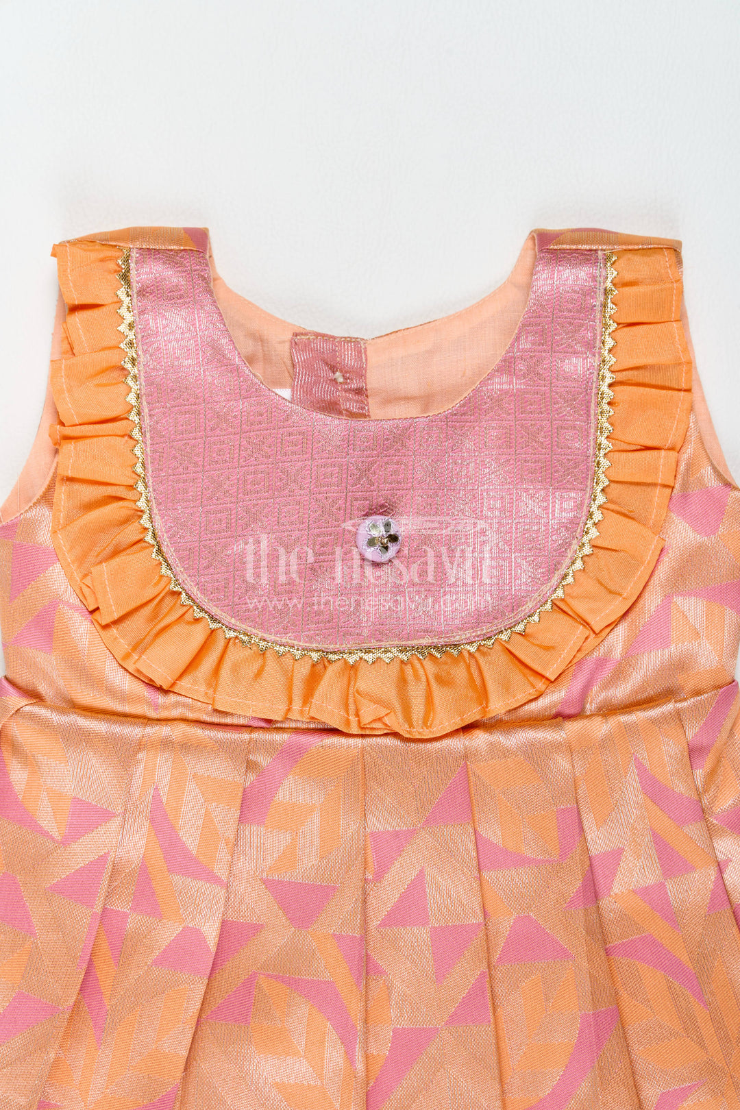 The Nesavu Girls Kanchi Silk Frock Silk Frock for Girls in Peach with an Occasion Ready Finish Nesavu Nesavu Silk Frock For Girls In Peach For Parties And Memorable Photos