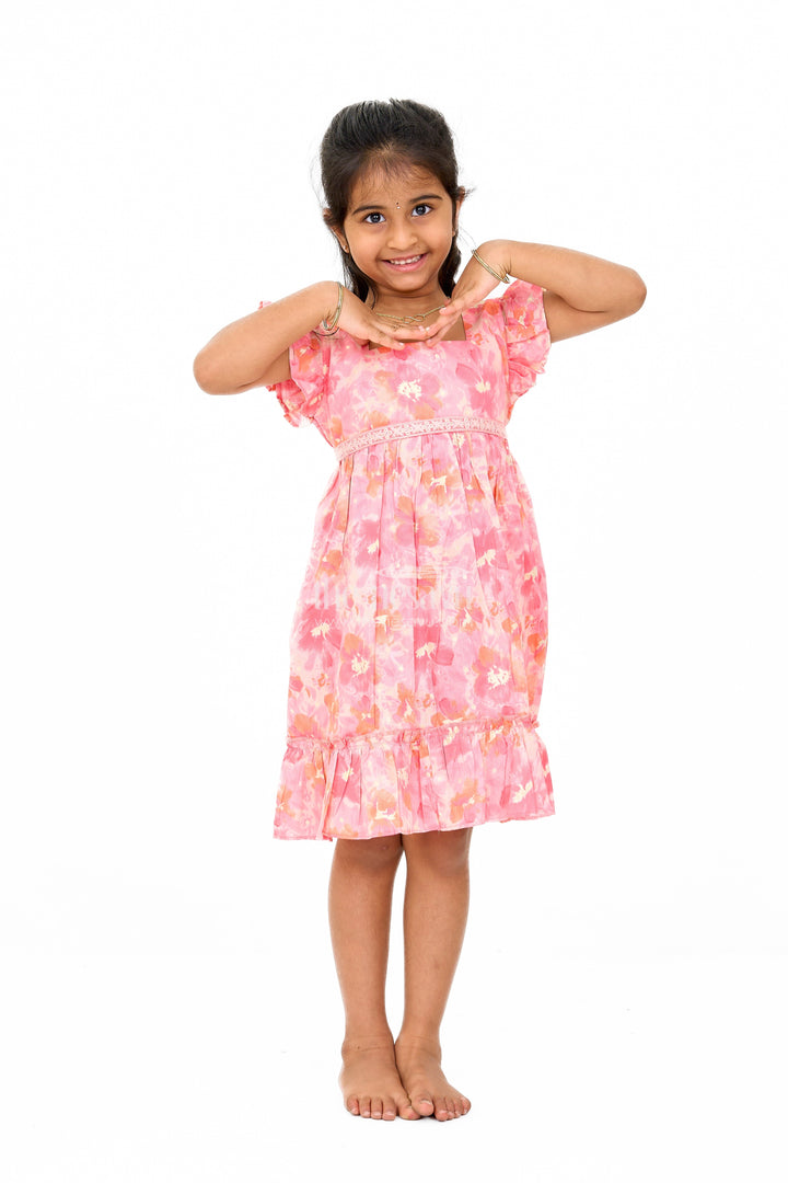 The Nesavu Girls Cotton Frock Simple Cotton Frocks for Babies in Pink with Ruffled Hem and Floral Print Nesavu Simple Cotton Frocks Babies Ruffles Floral Prints Pink | The Nesavu