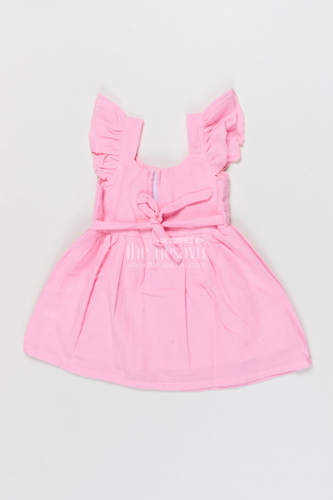 The Nesavu Girls Cotton Frock Soft Cotton Frock for Baby Girls’ Playful Outings Nesavu Nesavu baby girl cotton frock with rosette detail and flutter sleeves for casual wear