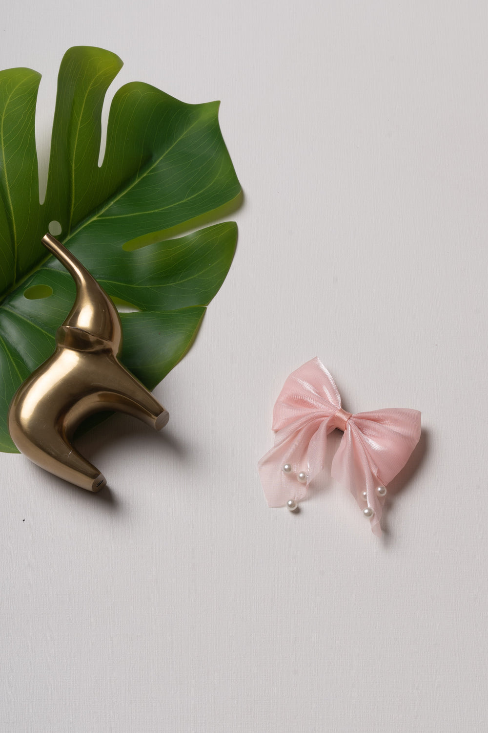 The Nesavu Hair Clip Soft Pink Satin Bow Hair Clip with Pearl Accents for Timeless Elegance Nesavu Pink JHCL76E Elegant Soft Pink Satin Bow Hair Clip | Pearl-Adorned Accessory for Stylish Women | The Nesavu