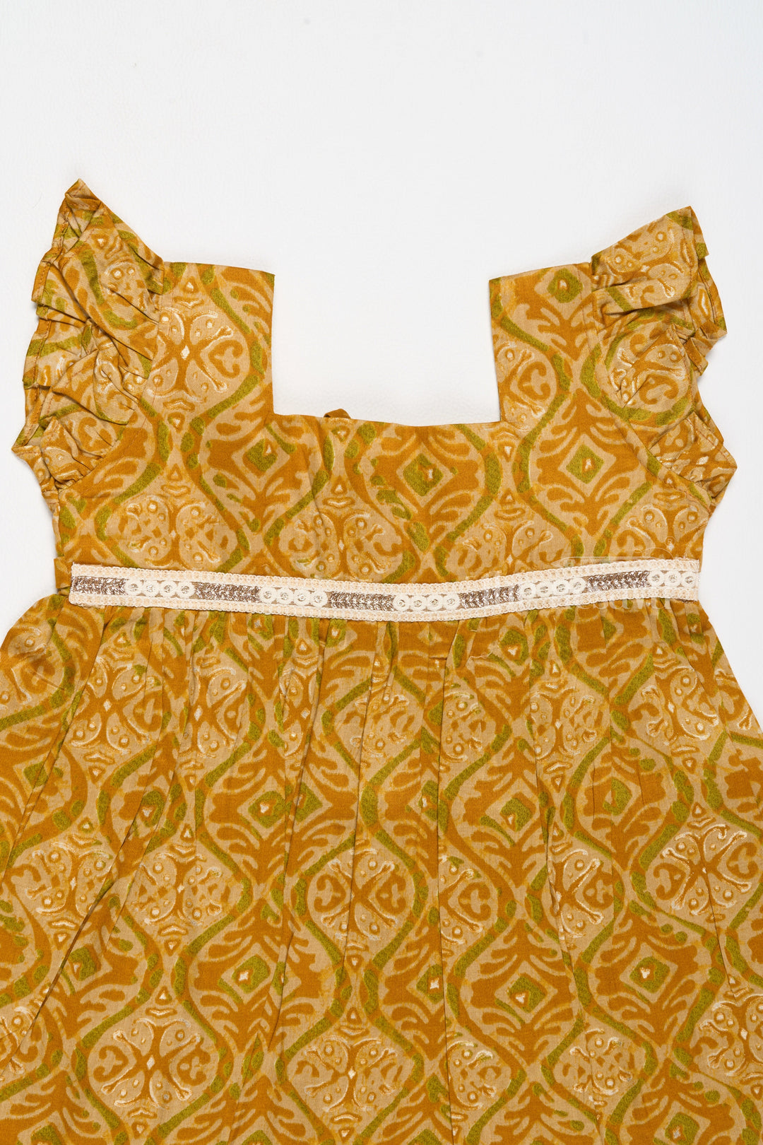 The Nesavu Girls Cotton Frock Solid Cotton Dress for Girls in Mustard with Ruffle and Lace Details Nesavu Solid Cotton Dress Girls Lace Waistband Ruffle Hem Mustard | The Nesavu