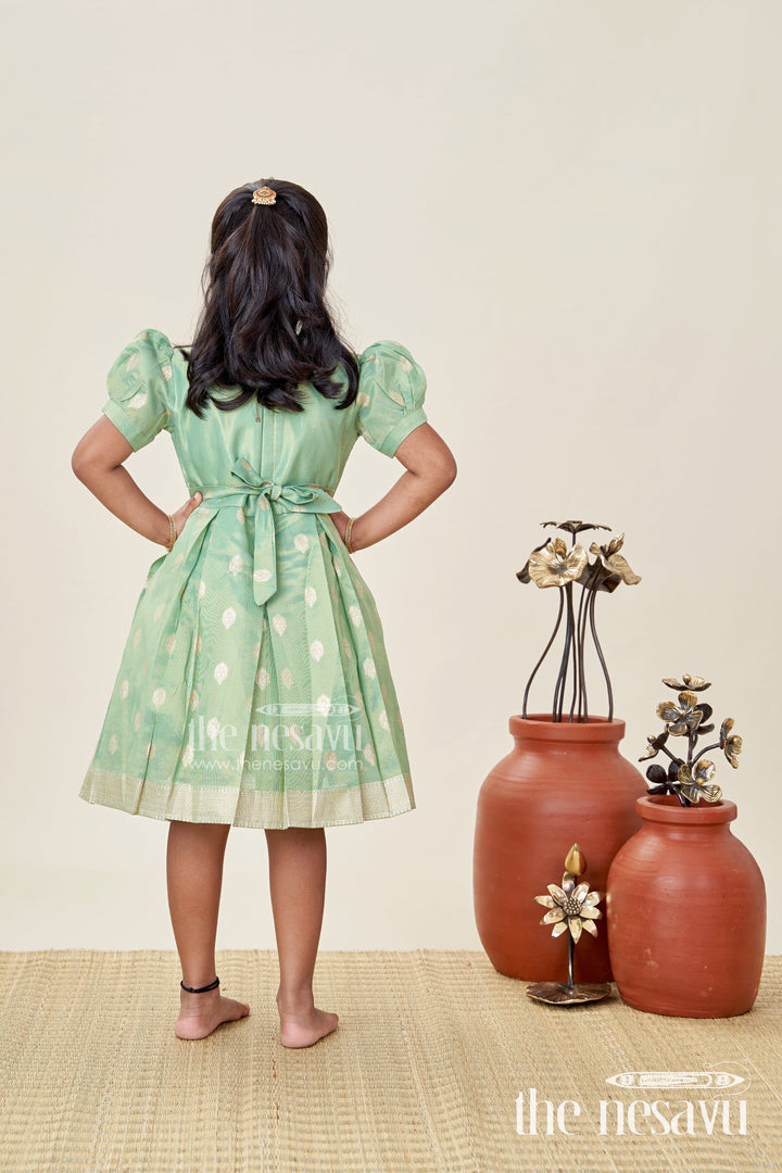 The Nesavu Silk Frock South Indian Traditional Silk Dress for Baby Girls with Zari Work Nesavu Nesavu Traditional South Indian Green Silk Frock Girls Golden Tissue Bottom Zari Accents