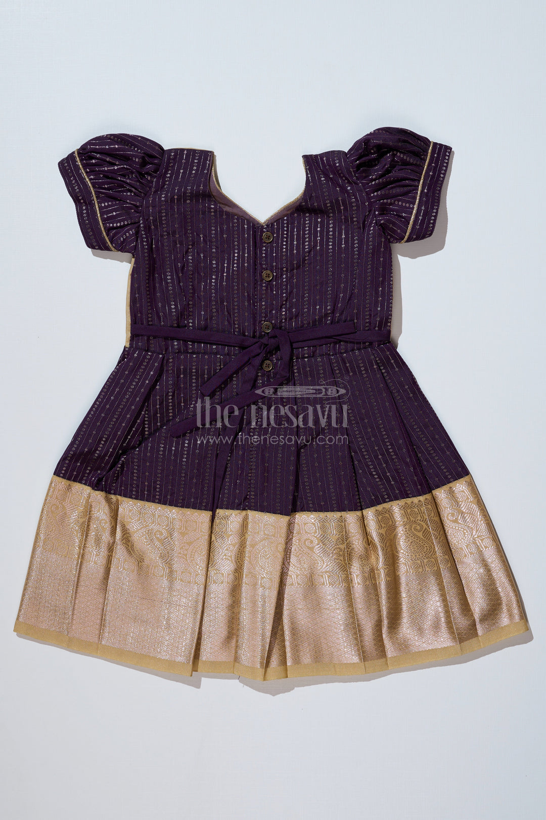 The Nesavu Girls Kanchi Silk Frock Stunning Magenta Silk Dress for Girls with Kanchipuram Inspired Fabric and Gold Zari Pleated Border Nesavu Nesavu Magenta Silk Dress Girls Kanchipuram Inspired Fabric Gold Zari Pleated Border