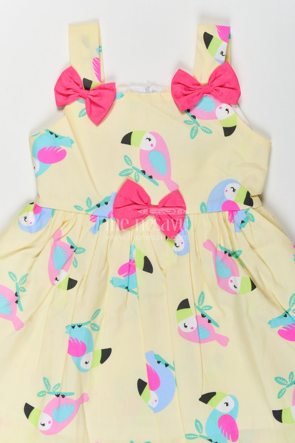 The Nesavu Baby Fancy Frock Stylish Frock Short Dress for Baby Girls in Pure Cotton with Bird Print and Bow Embellishments Nesavu Nesavu Frock Short Dress Baby Girls Pure Cotton Bird Print Bow Embellishments