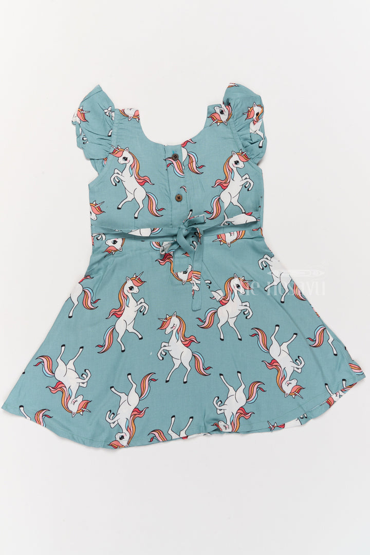 The Nesavu Girls Cotton Frock Stylish Girls Cotton Straight Dress with Unicorn Print and Ruffled Sleeves Nesavu Girls Cotton Straight Dress Unicorn Print Ruffled Sleeves Teal Finish | The Nesavu