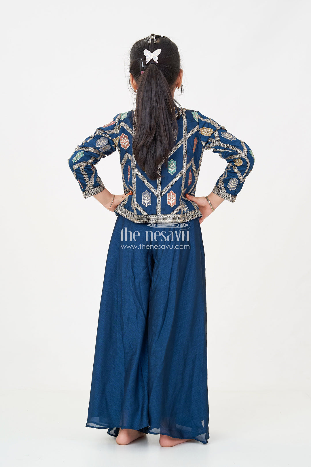 The Nesavu Girls Sharara / Plazo Set Stylish Party Wear for Girls in Blue Georgette Palazzo Set with Heavily Embroidered Jacket and Crop Top Nesavu Nesavu Stylish Party Wear for Girls in Blue Georgette Palazzo Set with Embroidered Long Jacket and Top