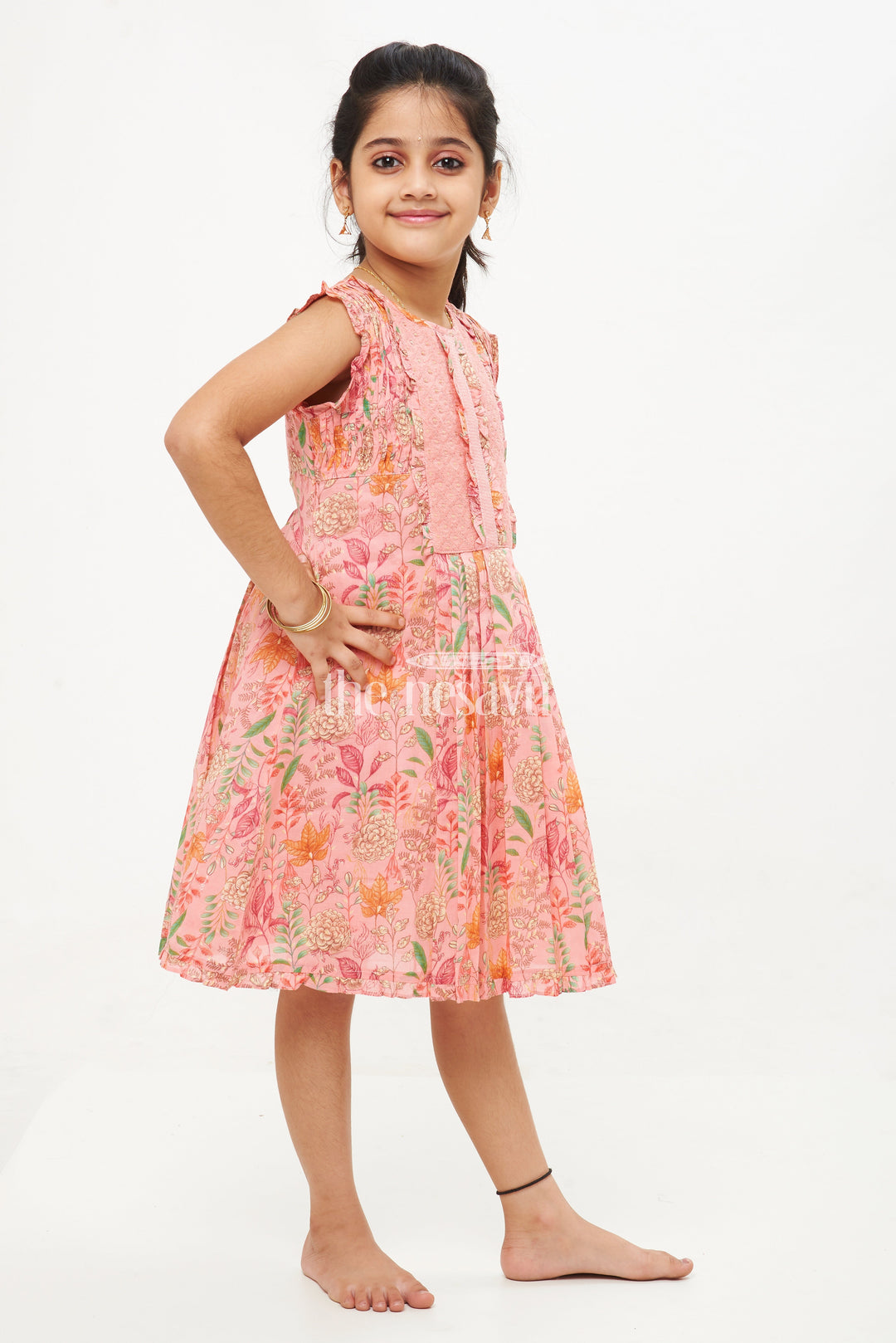 The Nesavu Girls Cotton Frock Stylish Sleeveless A-Line Cotton Dress with Floral Prints - Peach Nesavu Stylish Sleeveless A-Line Cotton Dress with Floral Prints - Nesavu | Peach