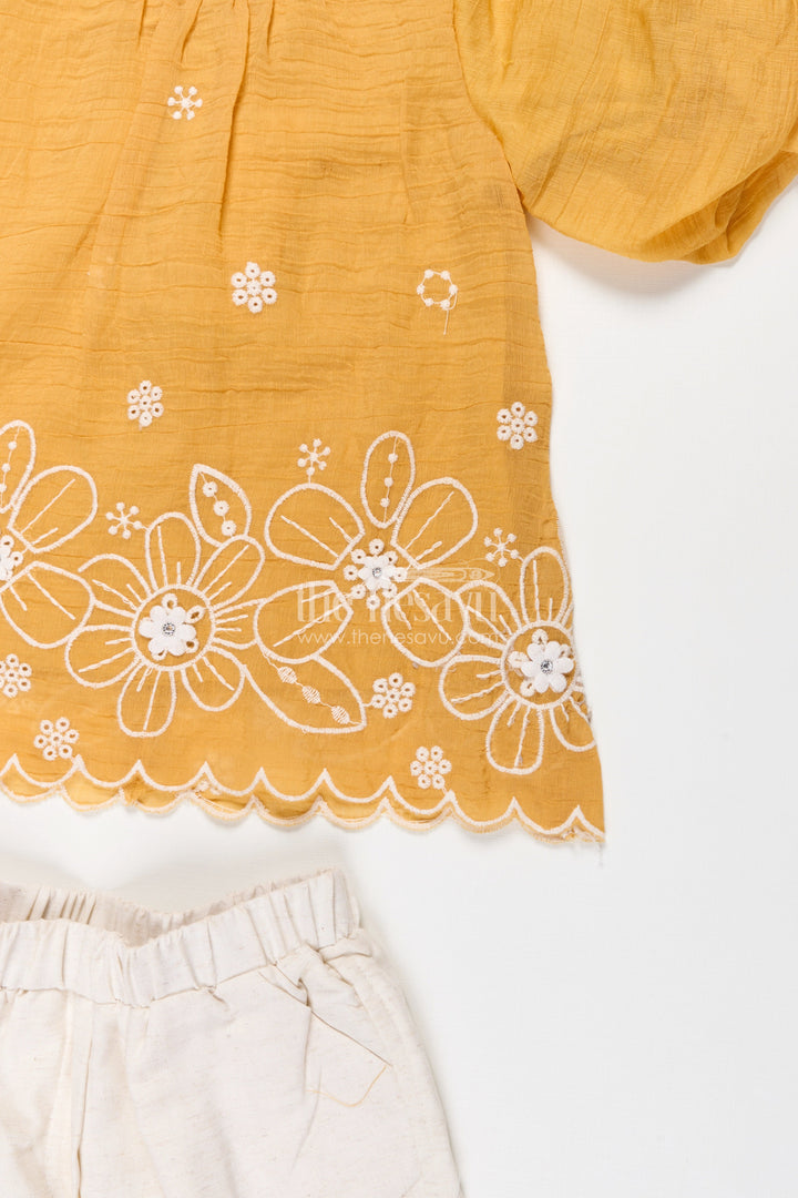 The Nesavu Girls Co-Ord Sets Suits and Co Ords for Girls in Mustard Cotton with White Pants and Floral Cutwork Embroidery Nesavu Suits Co Ords Girls Cotton Puff Sleeves White Embroidered Bottoms | The Nesavu