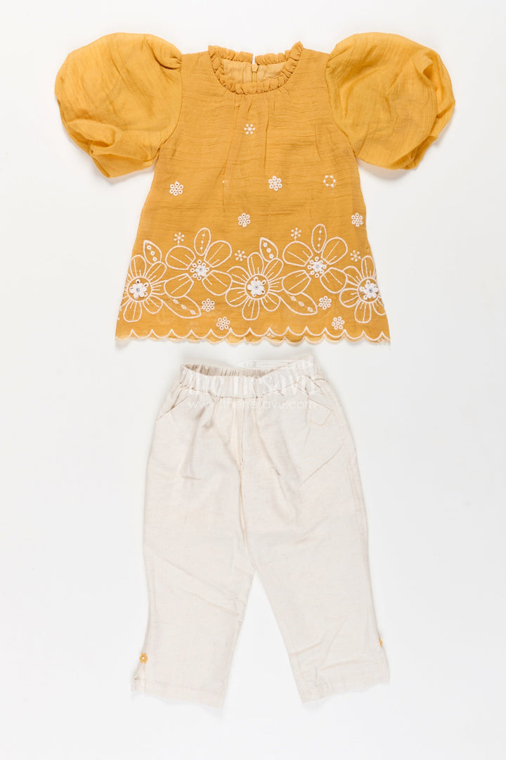 The Nesavu Girls Co-Ord Sets Suits and Co Ords for Girls in Mustard Cotton with White Pants and Floral Cutwork Embroidery Nesavu Suits Co Ords Girls Cotton Puff Sleeves White Embroidered Bottoms | The Nesavu