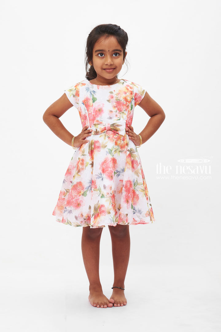 The Nesavu Girls Fancy Frock Summer Bloom Elegance Dress: Vibrant Floral Printed Frock for Girls with Bow Accent Nesavu 16 (1Y) / White GFC1190A-16 Girls Floral Summer Dress | White Frock with Vivid Flowers | Playful Bow Detail | The Nesavu