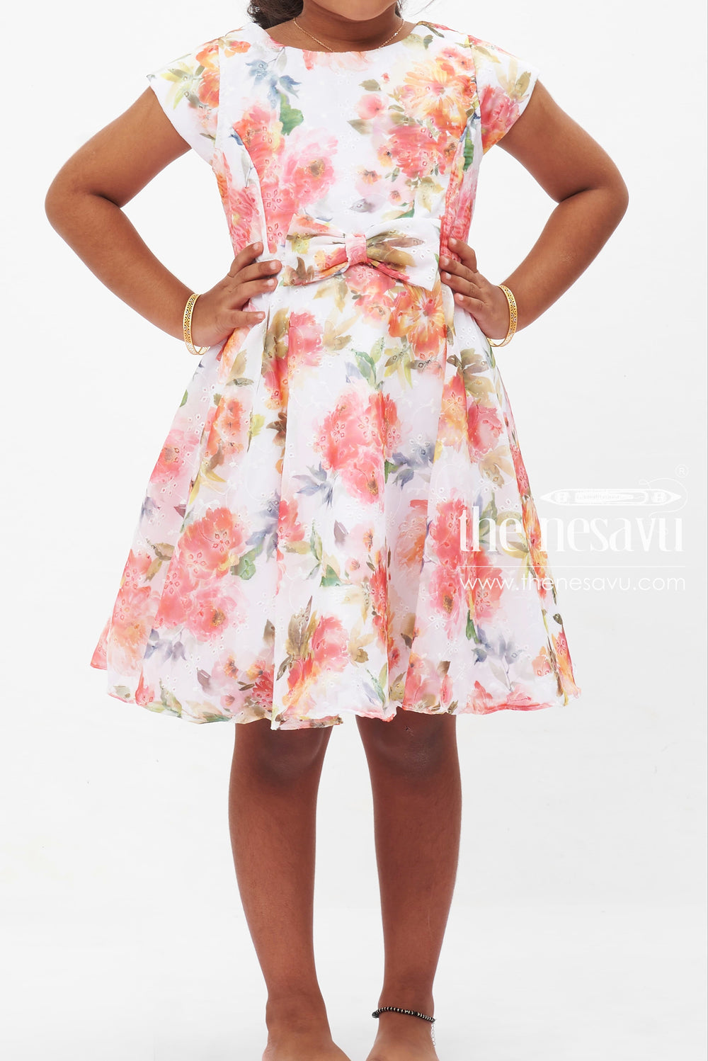 The Nesavu Girls Fancy Frock Summer Bloom Elegance Dress: Vibrant Floral Printed Frock for Girls with Bow Accent Nesavu Girls Floral Summer Dress | White Frock with Vivid Flowers | Playful Bow Detail | The Nesavu