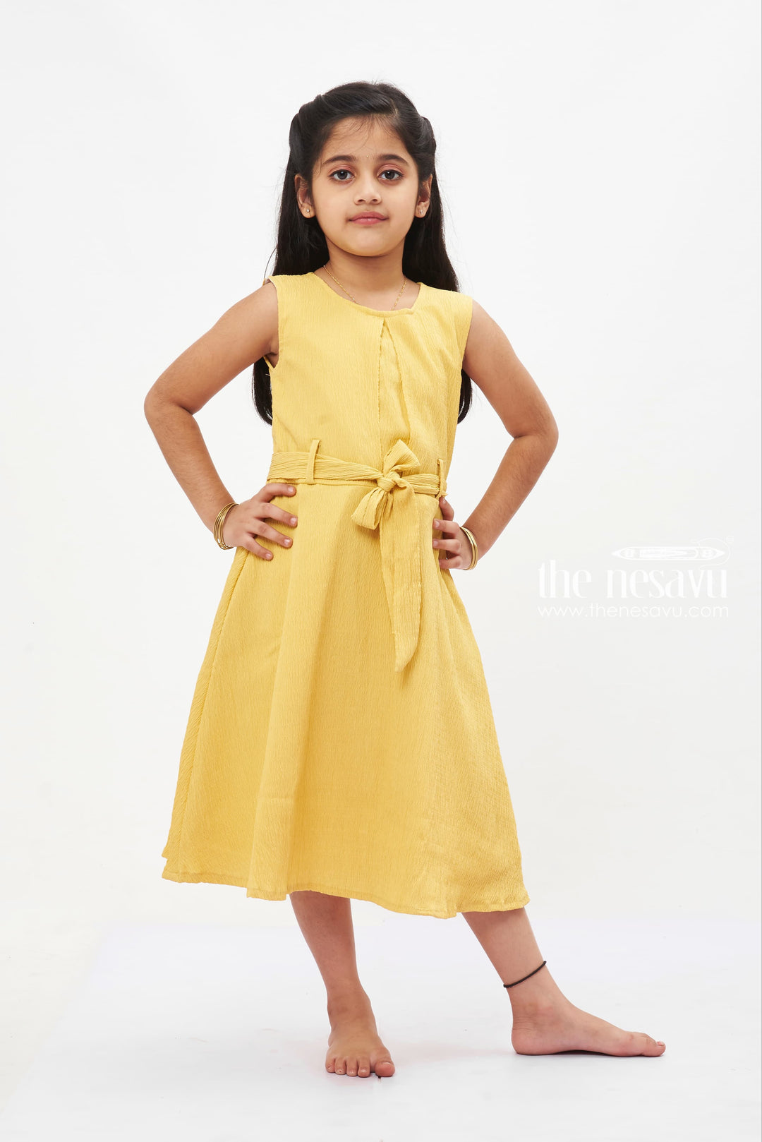 The Nesavu Girls Fancy Frock Sunny Yellow Bow Detail Cotton Dress: Bright and Beautiful for Girls Nesavu Girls' Vibrant Yellow Cotton Dress | Sleeveless Bow Frock | The Nesavu