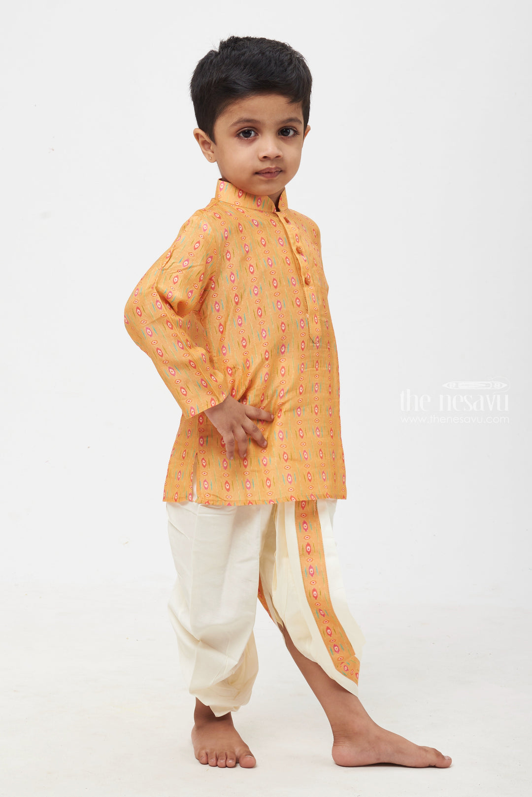 The Nesavu Boys Dothi Set Sunrise Splendor: Captivating Ikat Print Orange Kurta with Classic White Dhoti for Boys Nesavu 12 (3M) / Orange / Muslin Silk BES391B-12 Premium & Latest Boys Kurta Collection | Traditional Kurta with Dhoti Set | The Nesavu